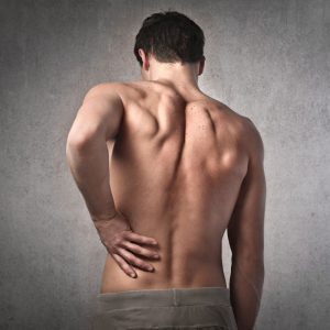 Chiropractic - man with back pain